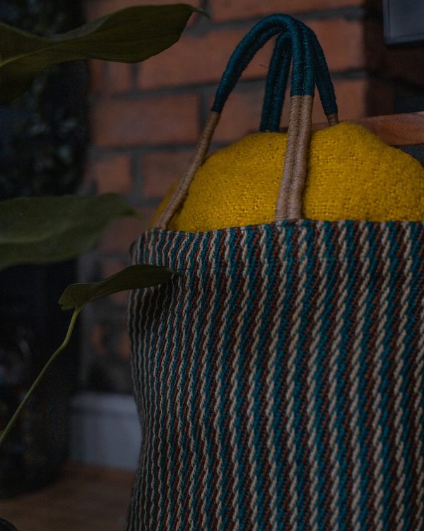 Eco-Friendly Teal Tote with Yellow Blanket in it
