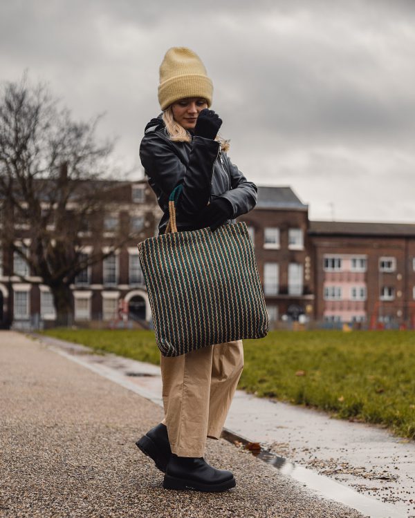 Woman Carrying an Eco-Friendly Teal Tote