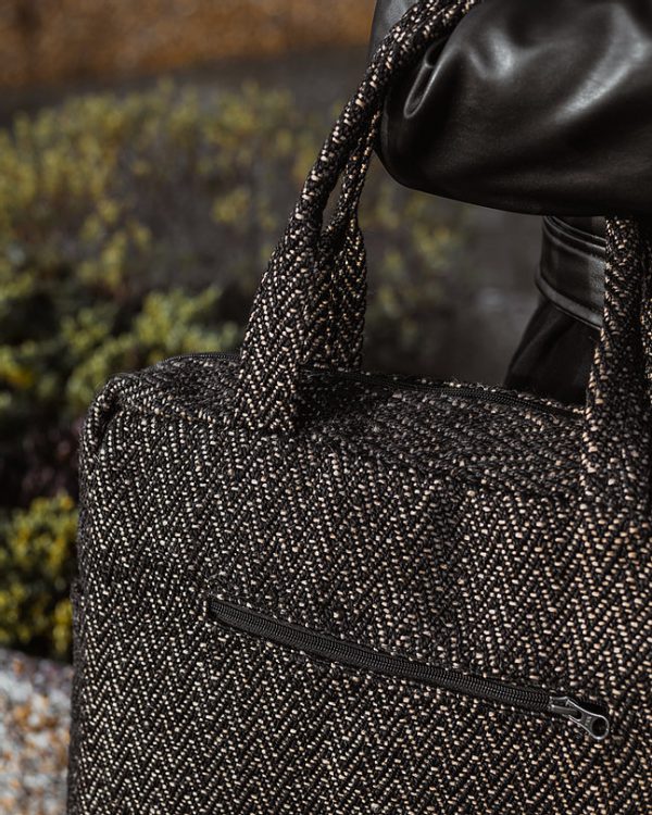 Someone Carrying a Hand Woven Laptop Bag