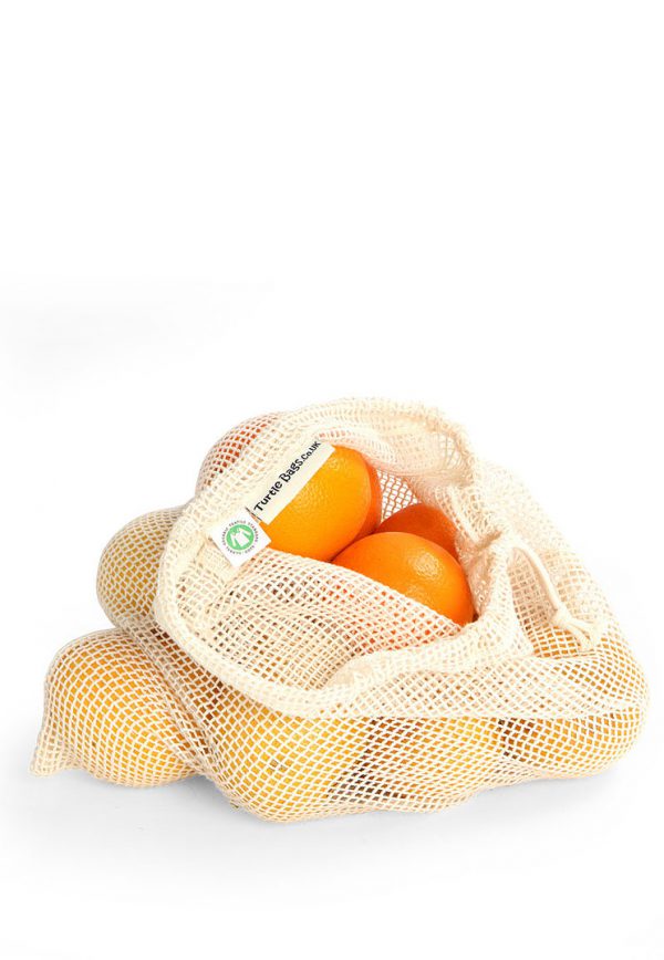 Organic cotton grocery bag with oranges in them